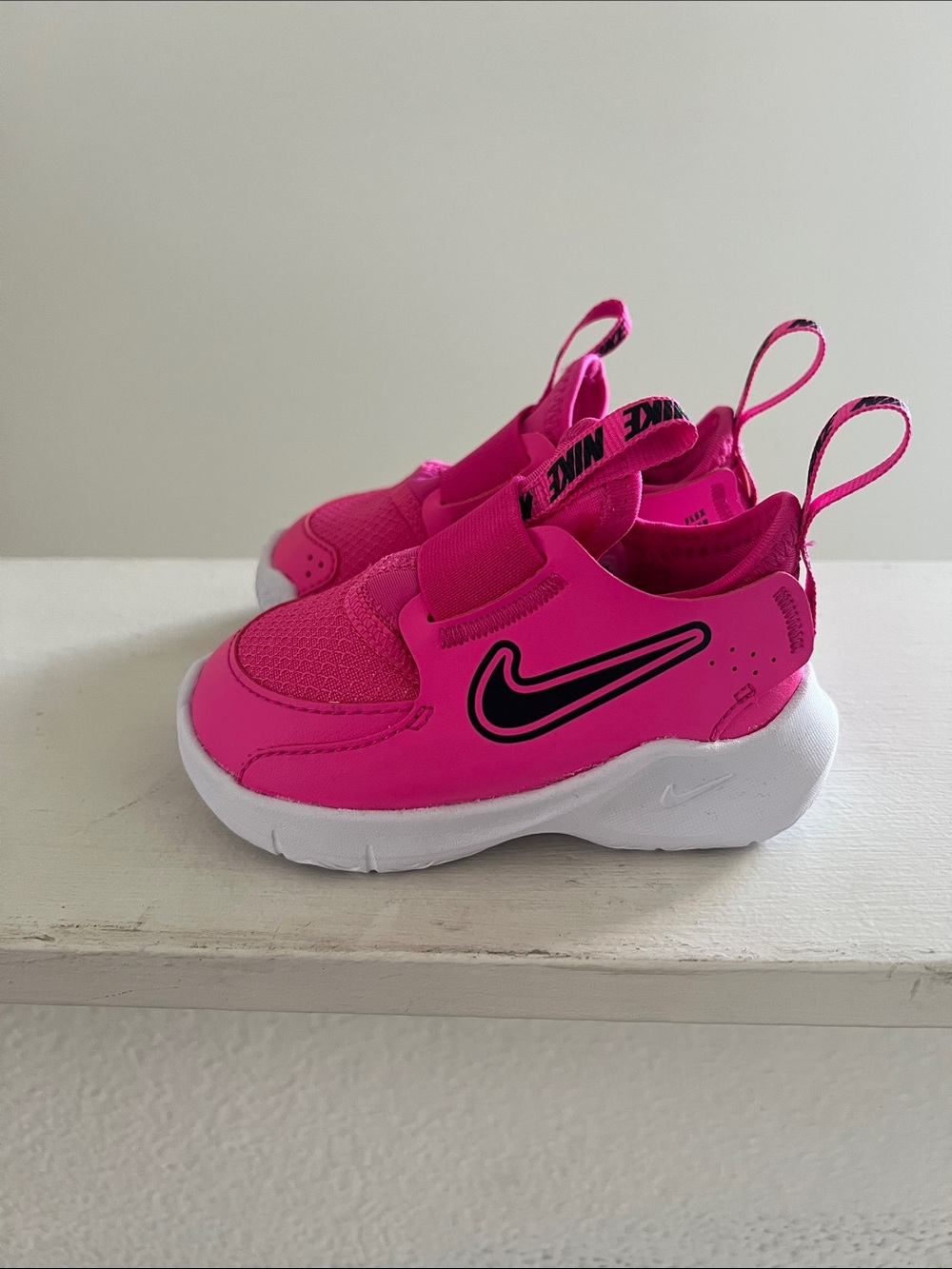 Nike Kids Hot Pink Slip-On Sneakers with Black Swoosh